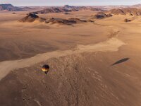 Floating over the Namib  Top Advanced Colour Print by Chris Millar